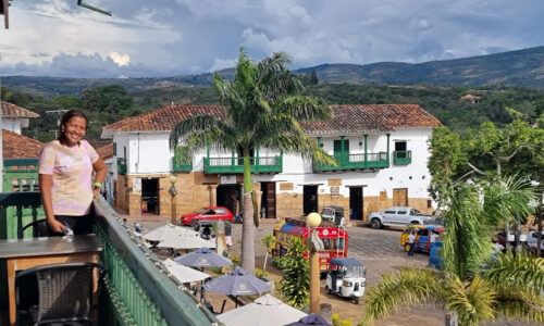A captivating view from the balcony in Barichara, Colombia, showcasing the town's stunning scenery and inviting charm.