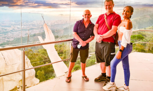 A joyous moment with friends at the Cerro del Santisimo Jesus statue viewing gallery, experiencing awe-inspiring beauty and creating cherished memories together.