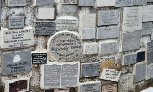 A poignant display of the "Wall of Prayers," adorned with heartfelt messages and wishes from visitors.