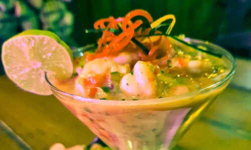 A tantalizing prawn cocktail, showcasing Santa Marta's exquisite seafood specialty with a burst of flavors and vibrant presentation.